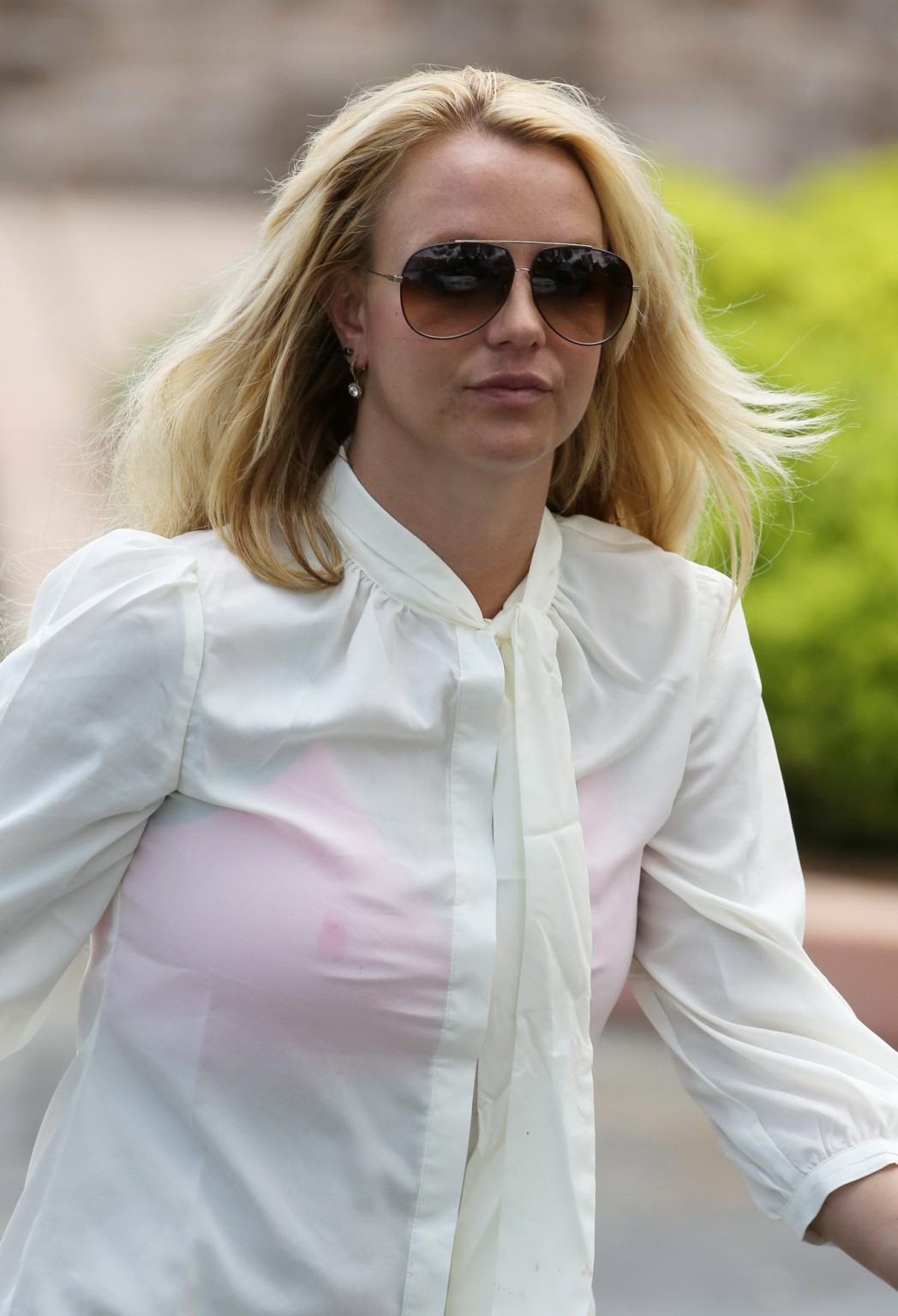Britney Spears wearing tight jeans  see through to bra outside a tanning salon i #75232725