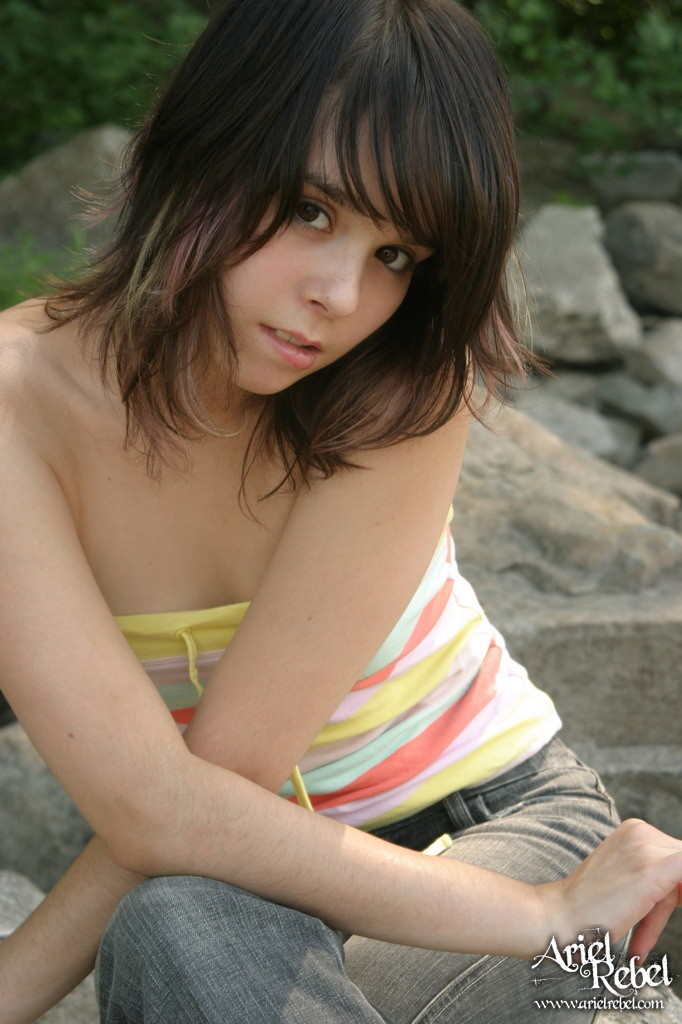 Sexy teen poses on the rocks #67670279