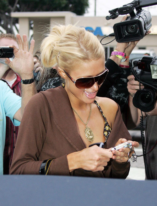Paris Hilton upskirt and nipple slip paparazzi pictures #75439469