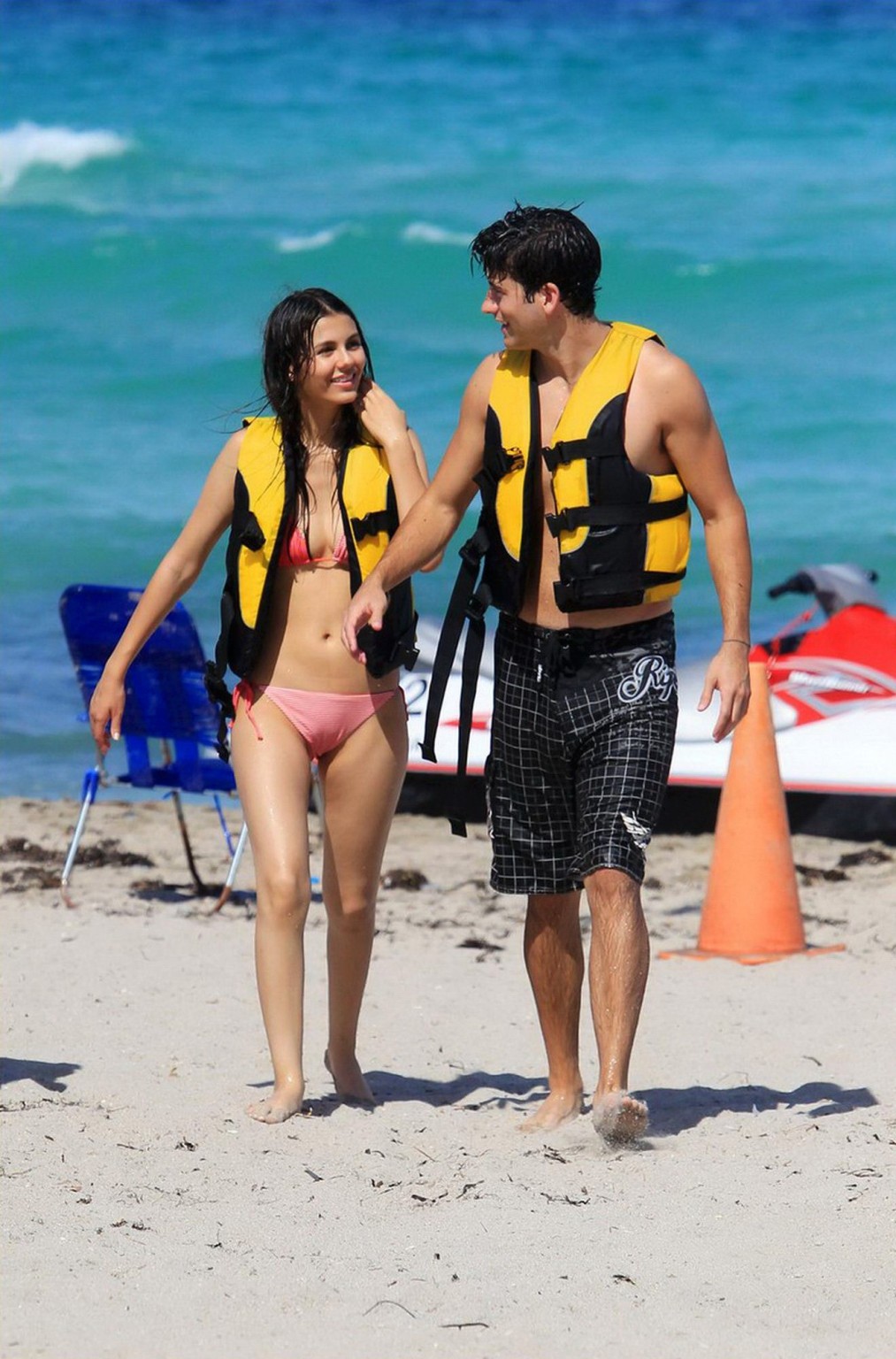 Victoria Justice shows cameltoe wearing wet bikini on a beach in Florida #75289721
