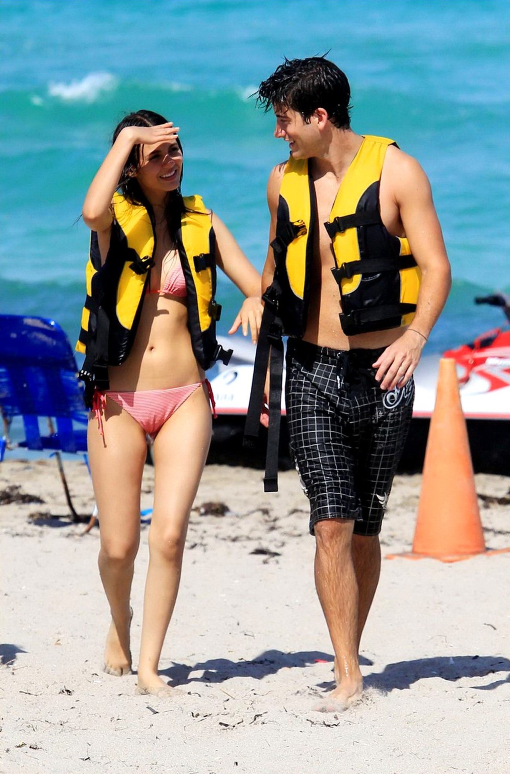 Victoria Justice shows cameltoe wearing wet bikini on a beach in Florida #75289731