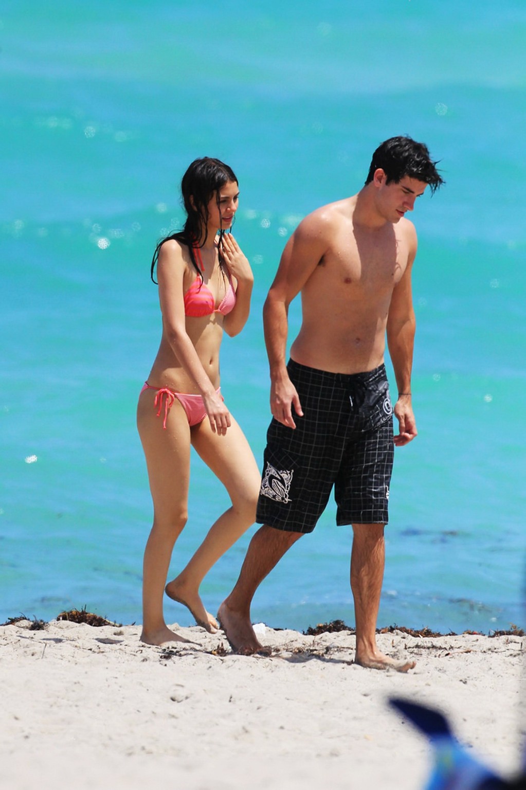Victoria Justice shows cameltoe wearing wet bikini on a beach in Florida #75289758
