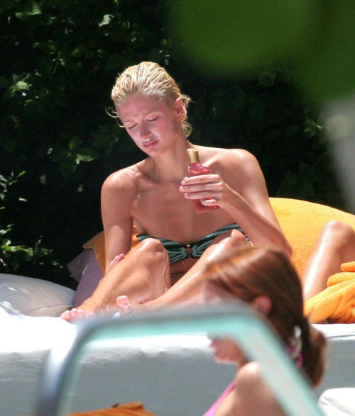 Paris Hilton in green bikini on beach paparazzi pictures #75441796