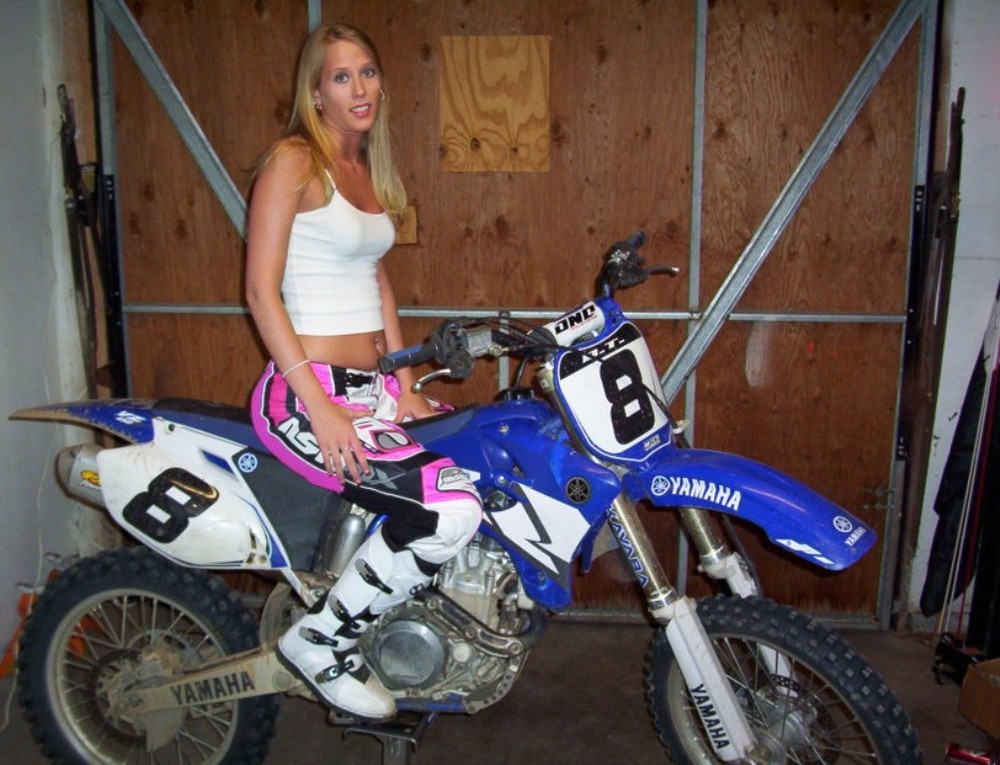 A blonde chicks riding a bike strips and shows her pink pussy #73693962