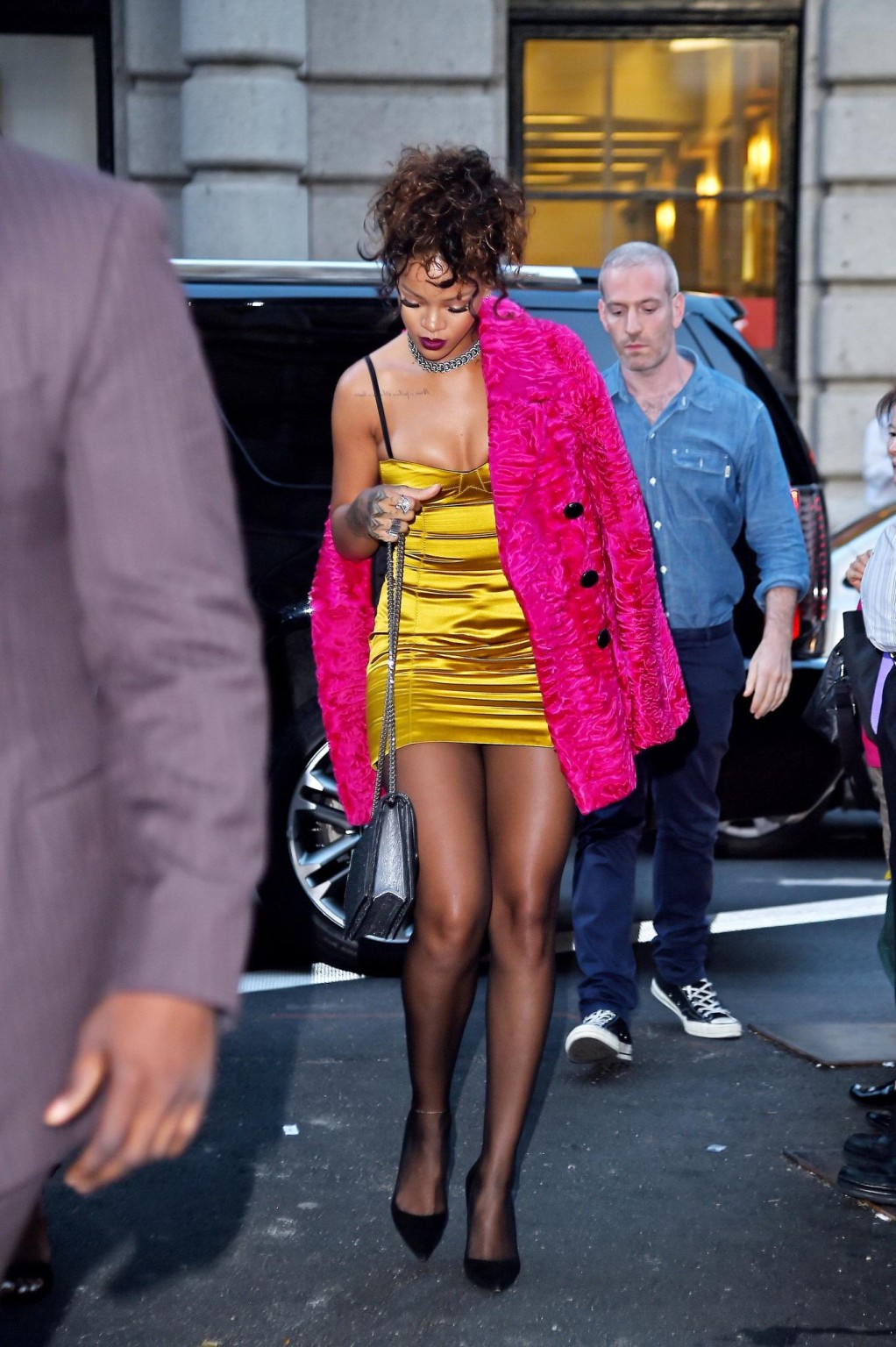 Rihanna shows cleavage and legs wearing a little yellow dress outside Nobu resta #75183279