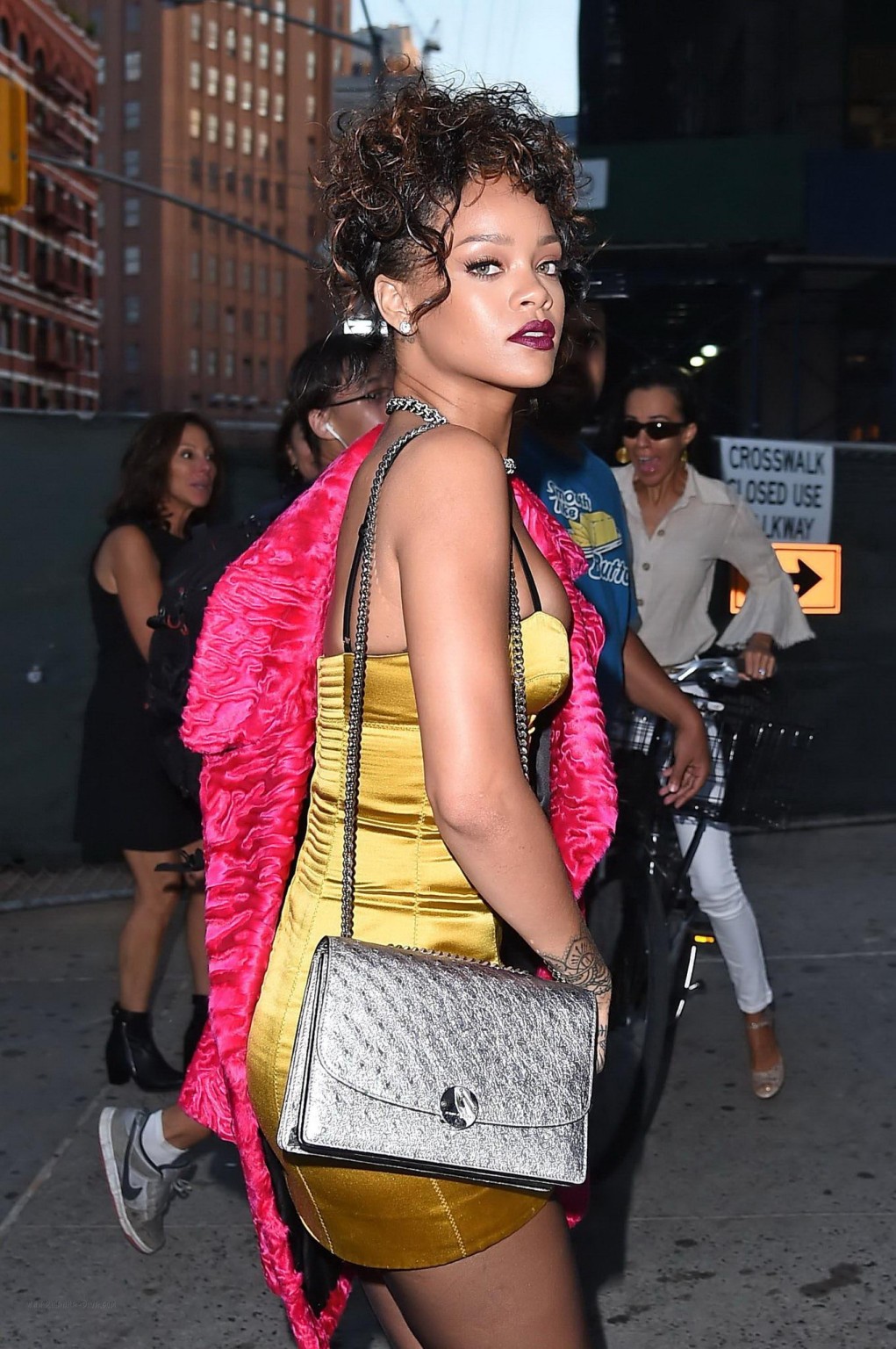 Rihanna shows cleavage and legs wearing a little yellow dress outside Nobu resta #75183350