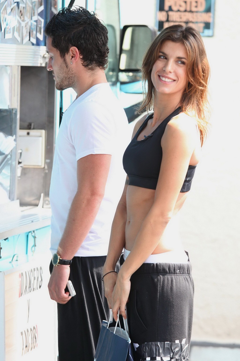 Elisabetta Canalis in sports bra  sweatpants showing off her abs outside the DWT #75288053