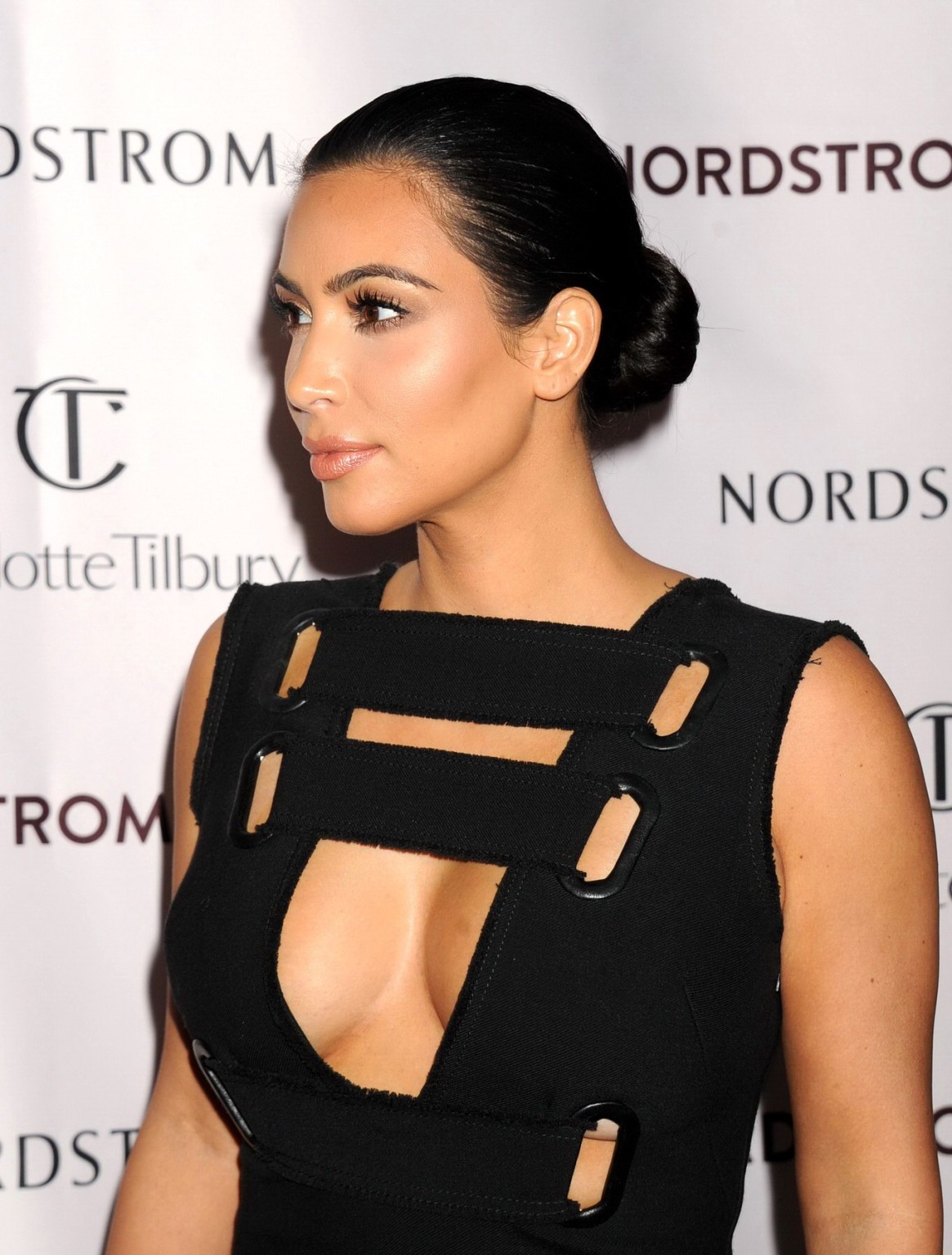 Kim Kardashian braless showing cleavage at Charlotte Tilburys Makeup Your Destin #75184062