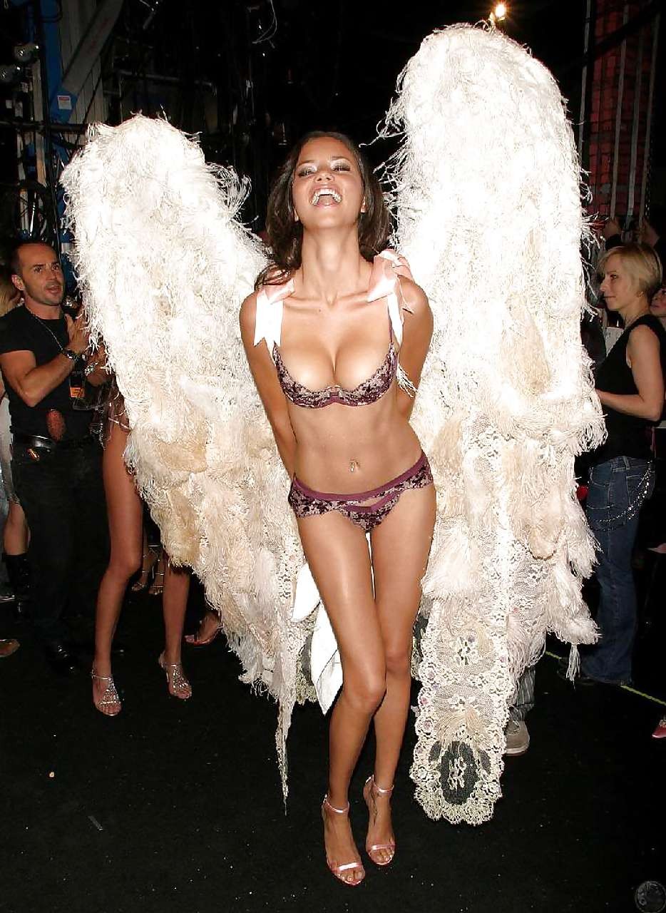 Adriana Lima tits slip paparazzi pictures and looking sexy in bikini #75280267