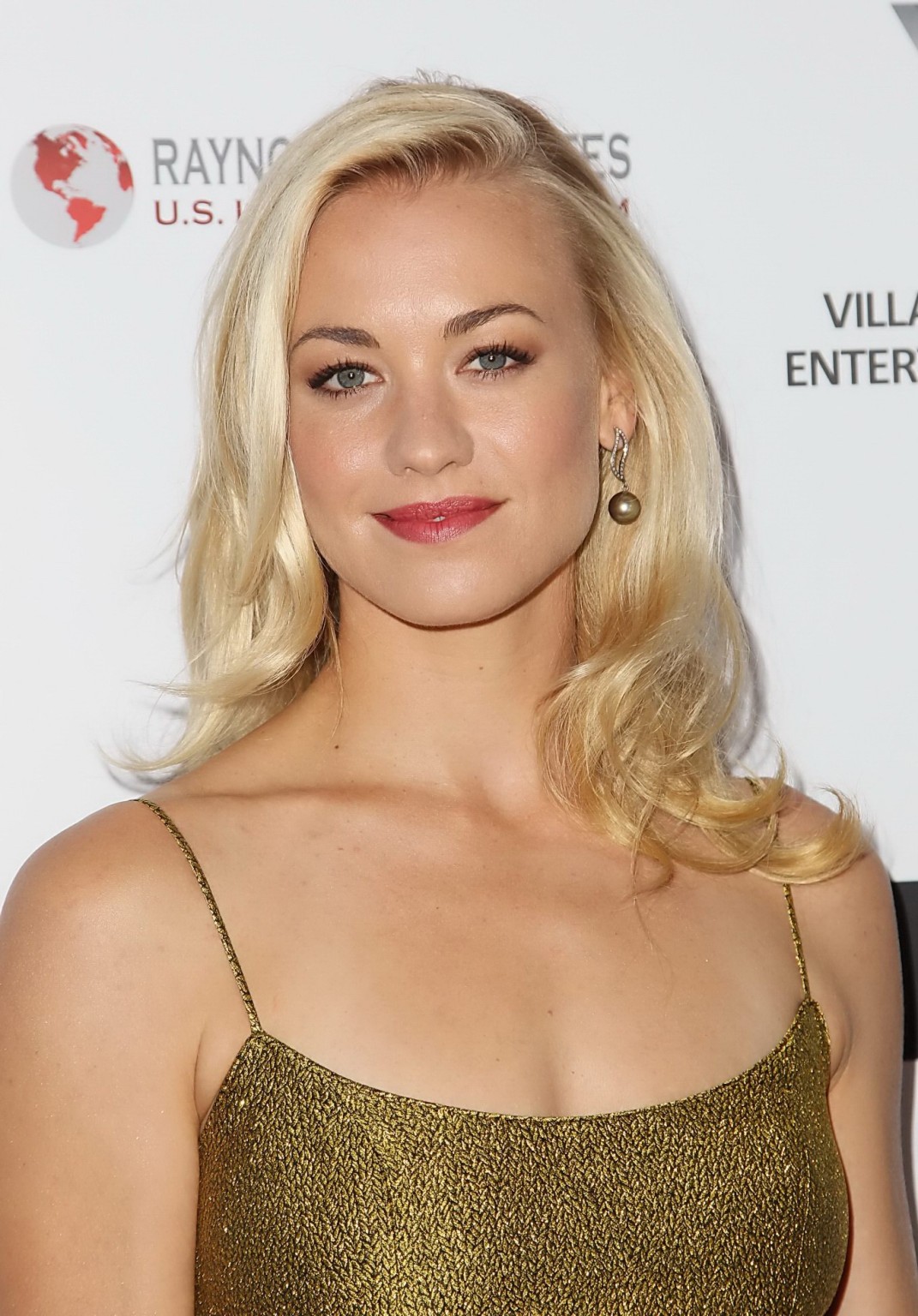 Yvonne Strahovski showing big cleavage in a tight golden dress at 2nd annual Aus #75215104