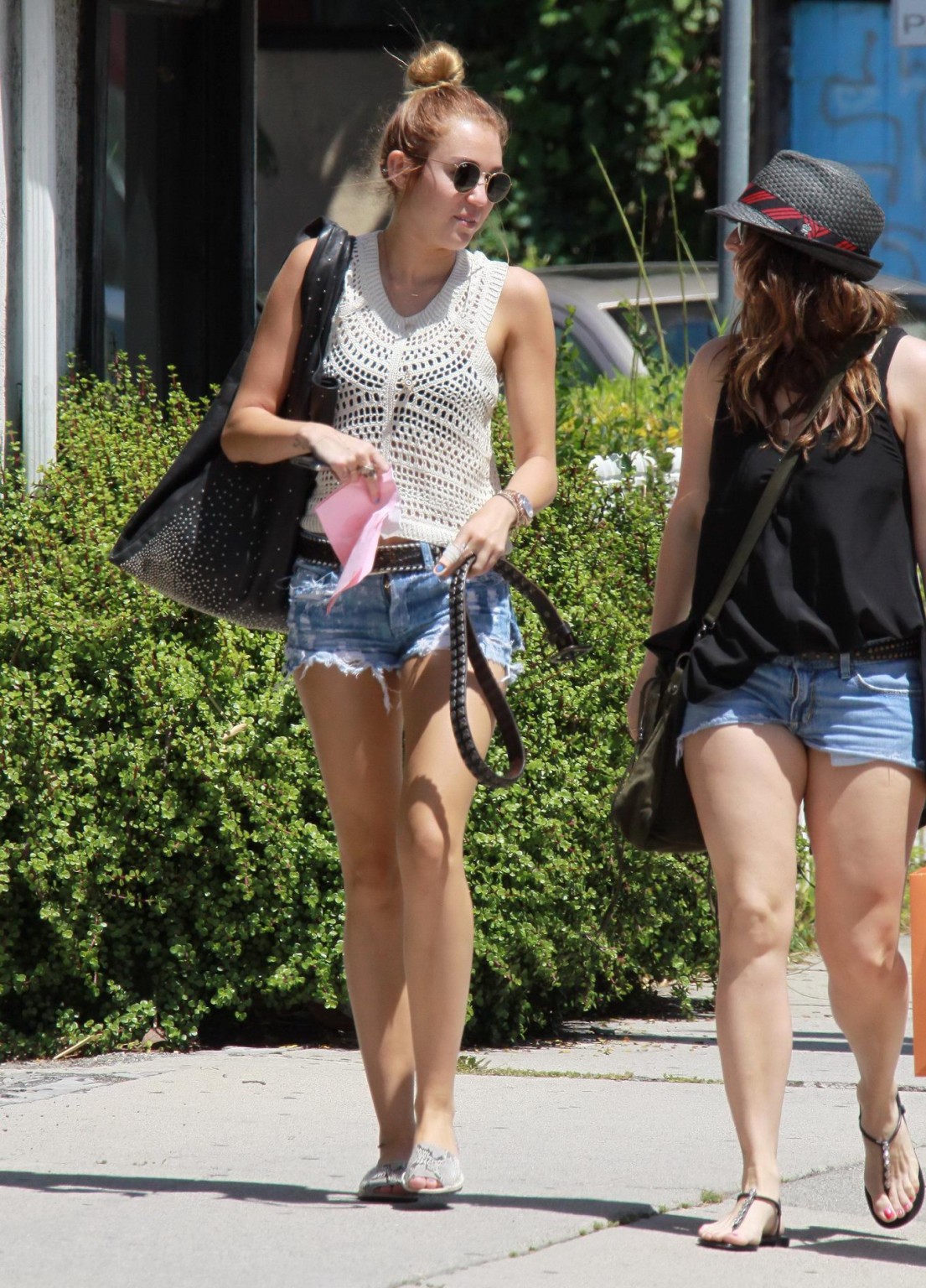 Miley Cyrus wearing denim shorts  c-thru lace top in Beverly Hills #75264678
