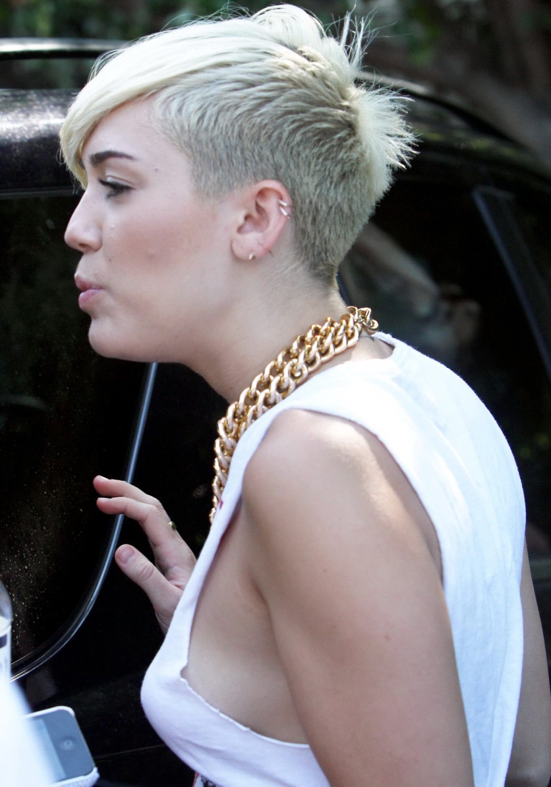Miley Cyrus braless showing side boob outside the 'Whole Foods' in LA #75252949