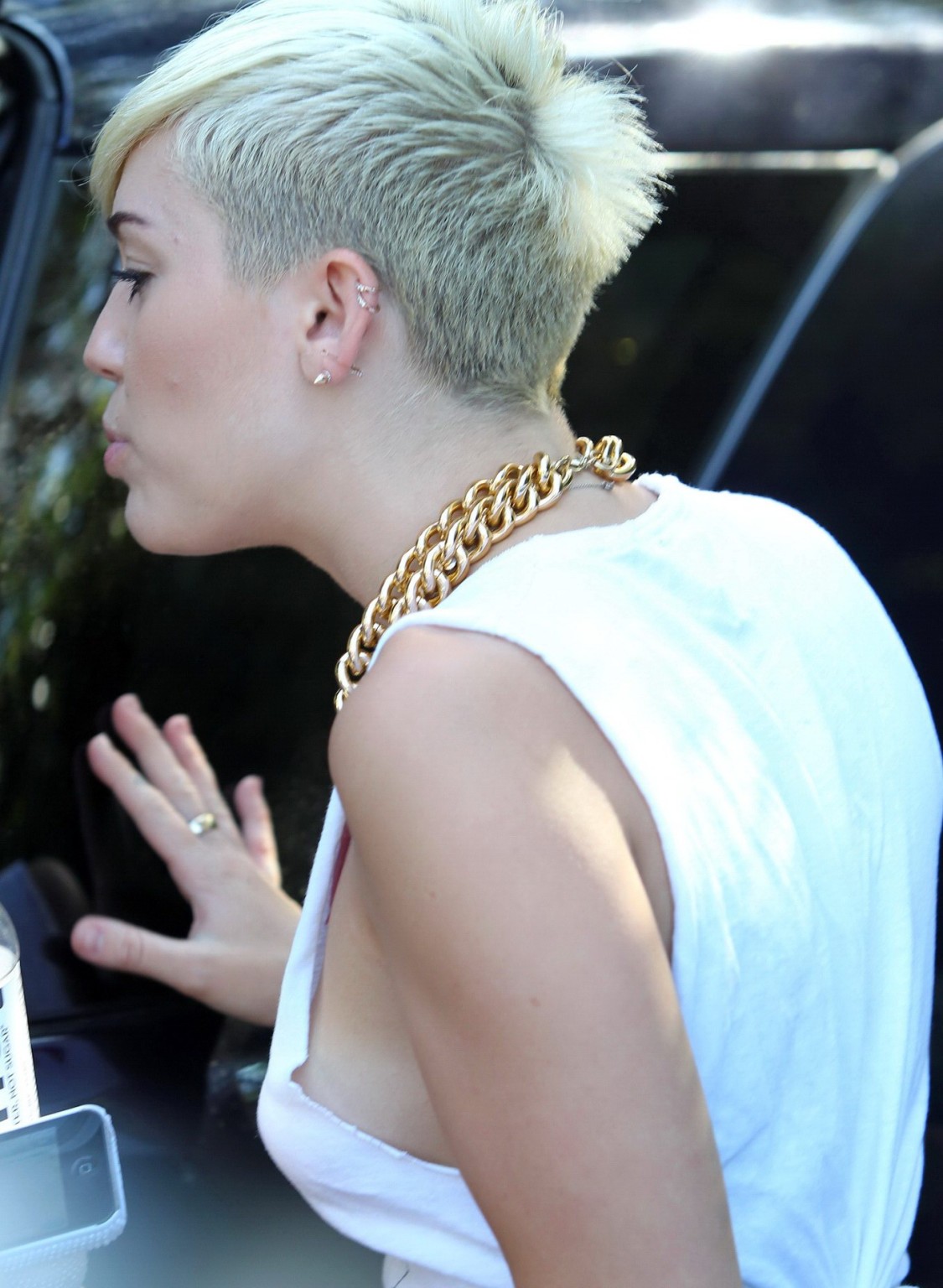 Miley Cyrus braless showing side boob outside the 'Whole Foods' in LA #75252959