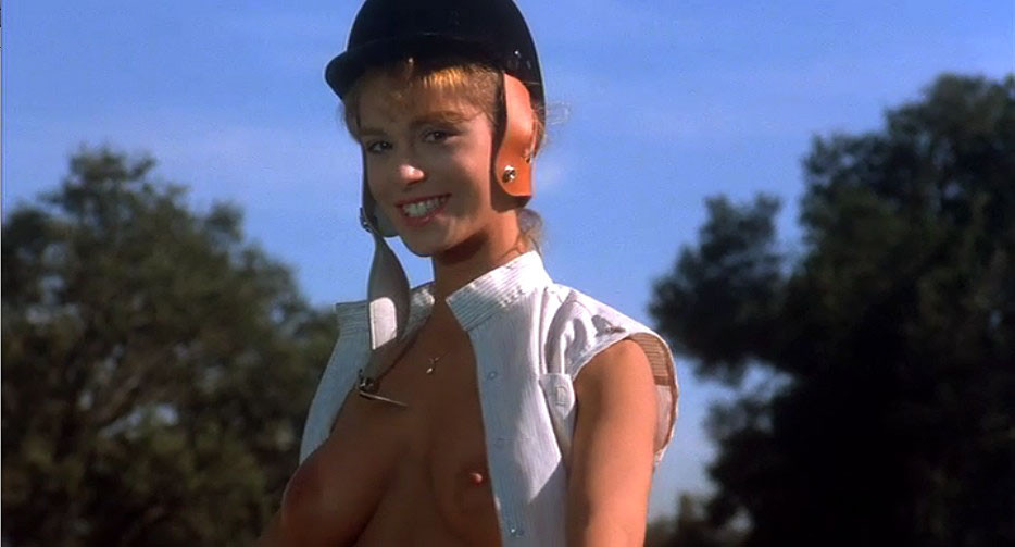 Betsy Russell showing her nice big tits while ride horse #75403162