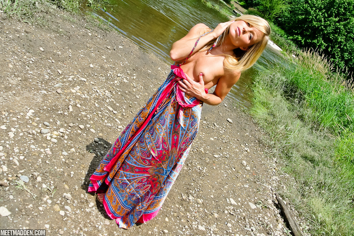 Beautiful blonde Meet Madden getting naked by a creek #70882243