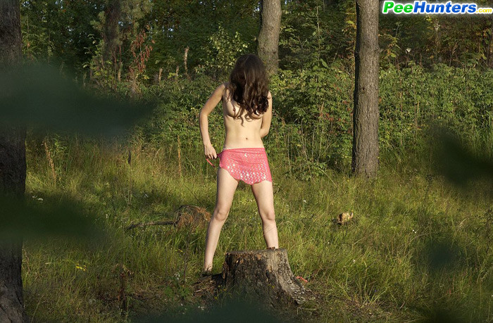 Naughty smoking girl takes a leak in the woods #78690713