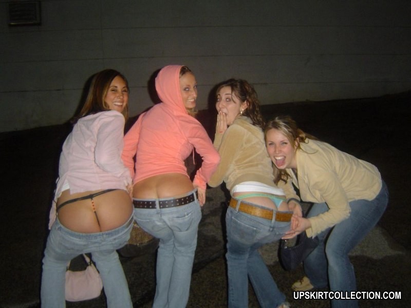 Girls in tight blue jeans erotically bending over #73180859