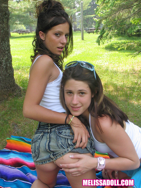 Two hotties messing around in the park #78269930