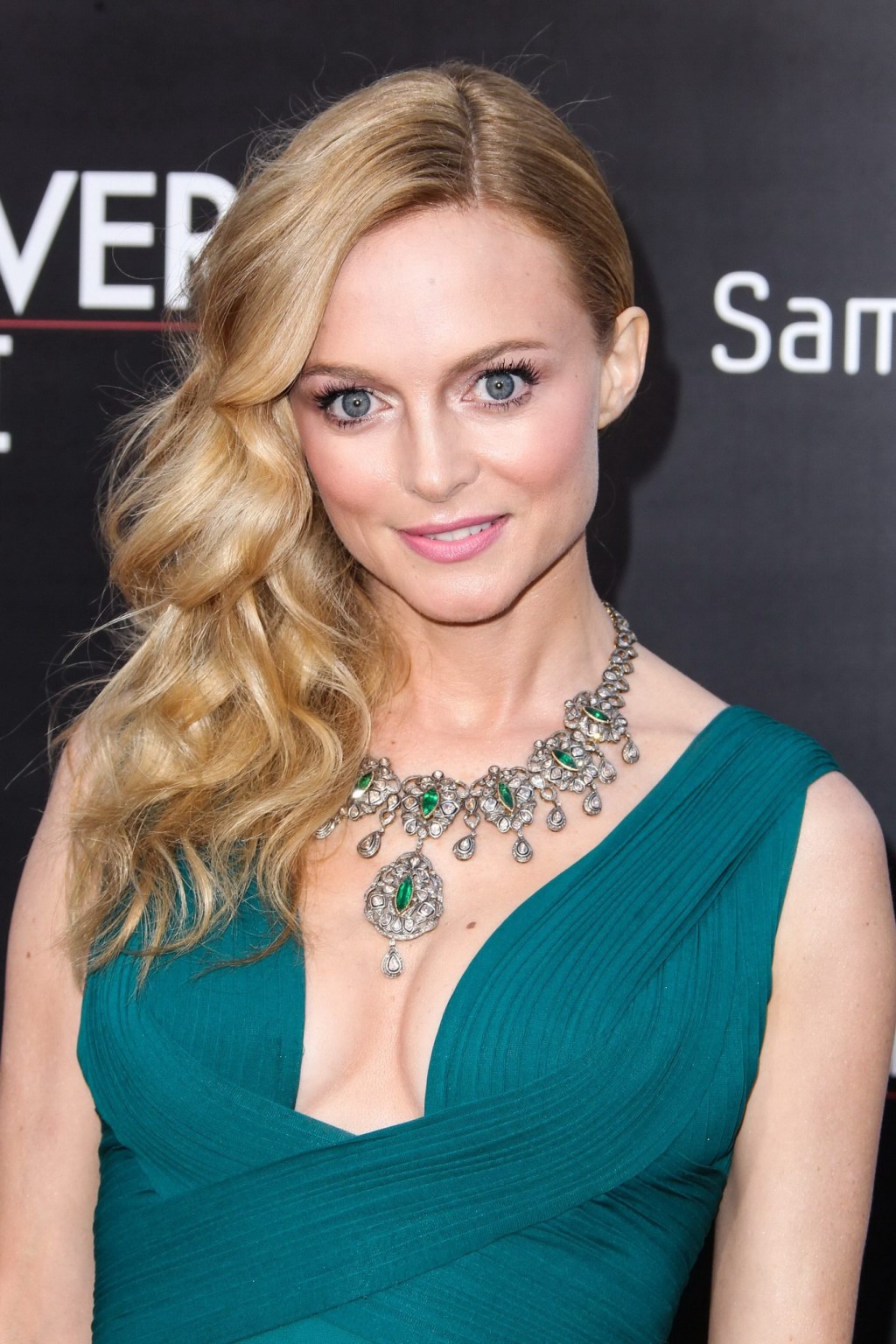 Heather Graham showing huge cleavage braless in a green low cut dress at the Han #75231638