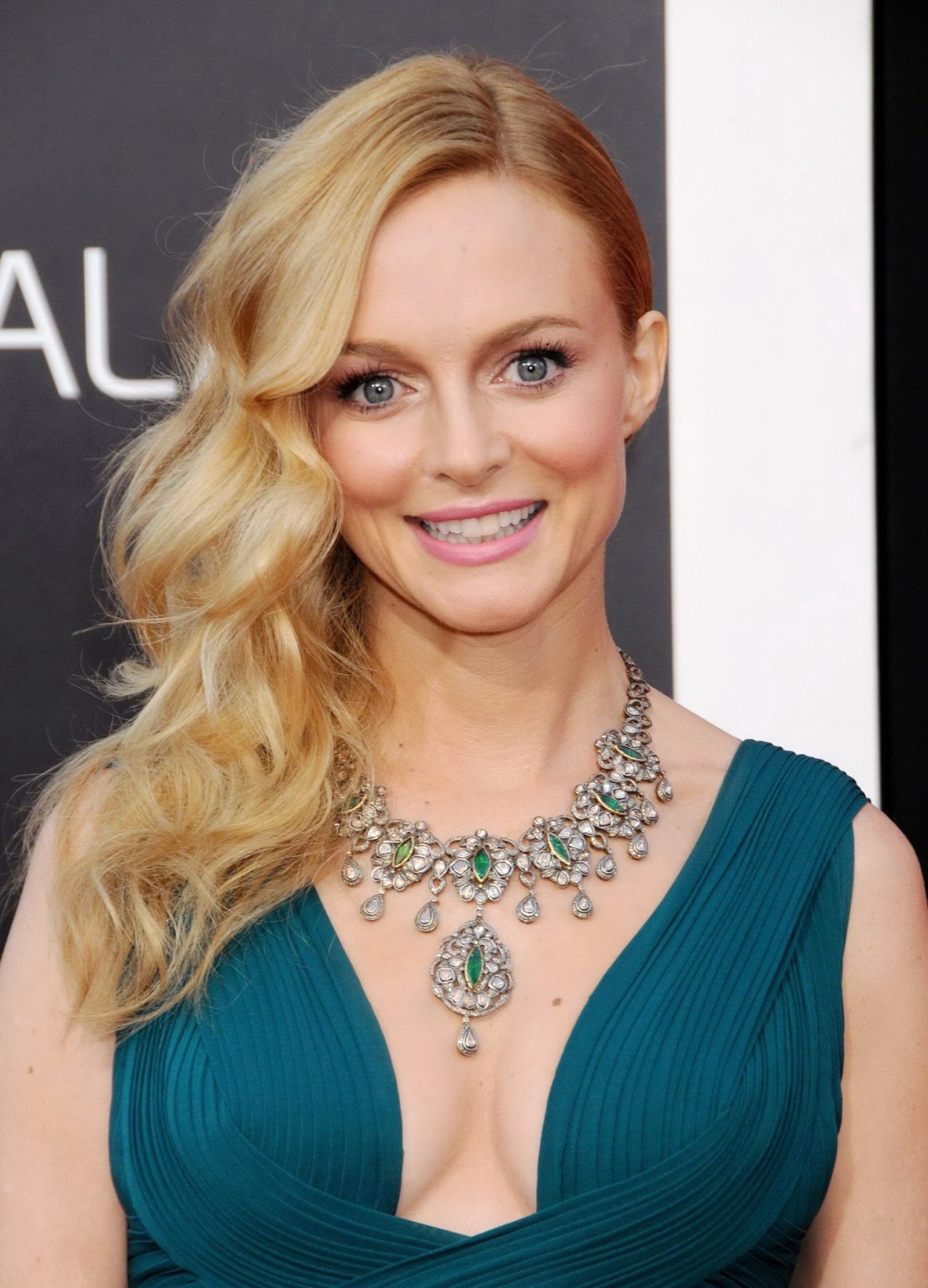 Heather Graham showing huge cleavage braless in a green low cut dress at the Han #75231640