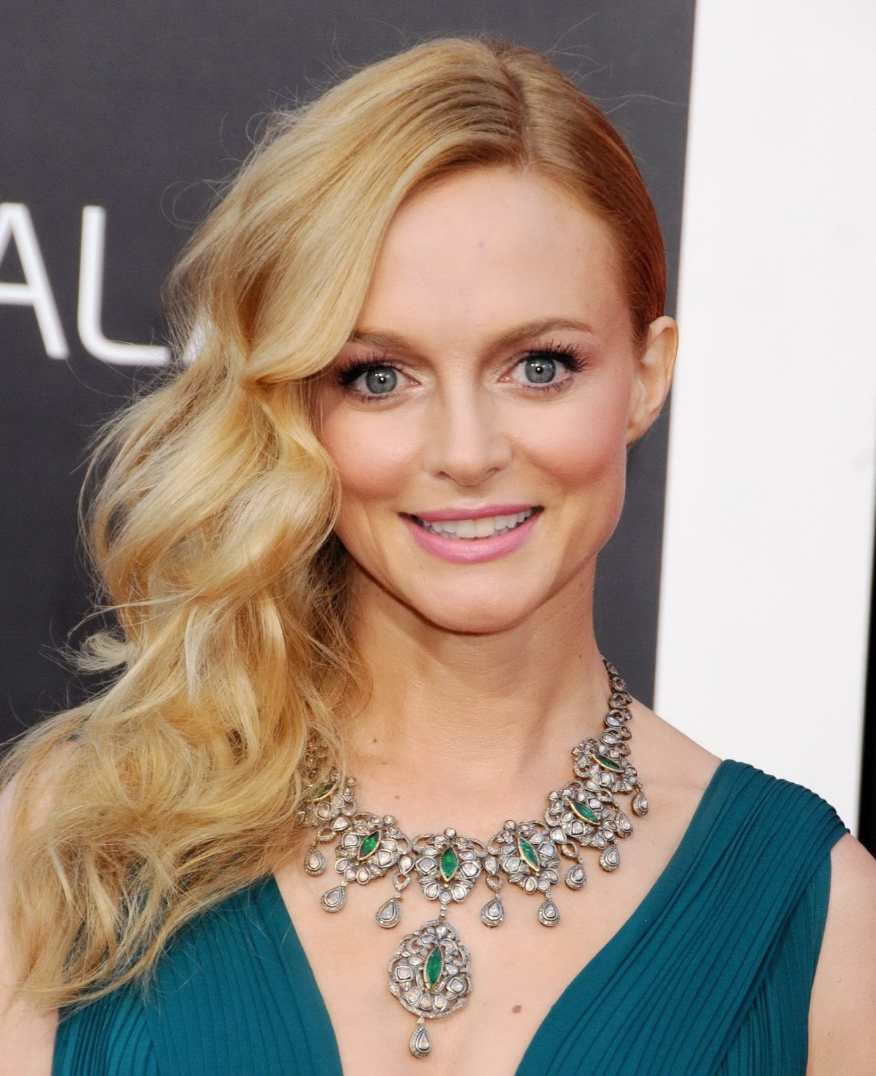 Heather Graham showing huge cleavage braless in a green low cut dress at the Han #75231643