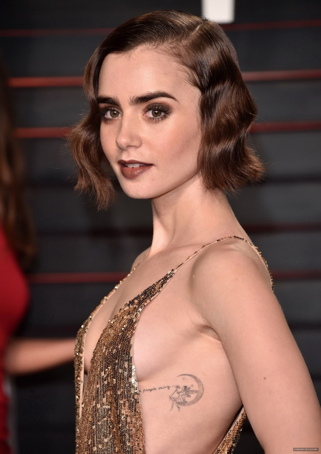 Lily Collins showing sideboob huge cleavage and legs #75145294