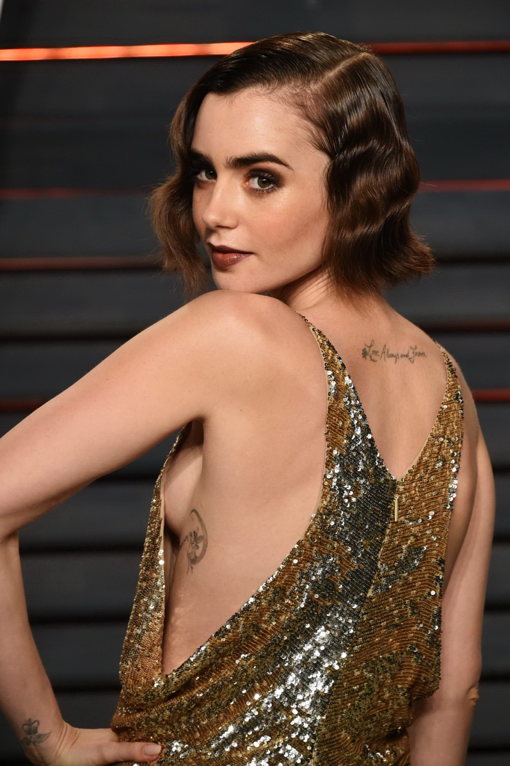 Lily Collins showing sideboob huge cleavage and legs #75145306
