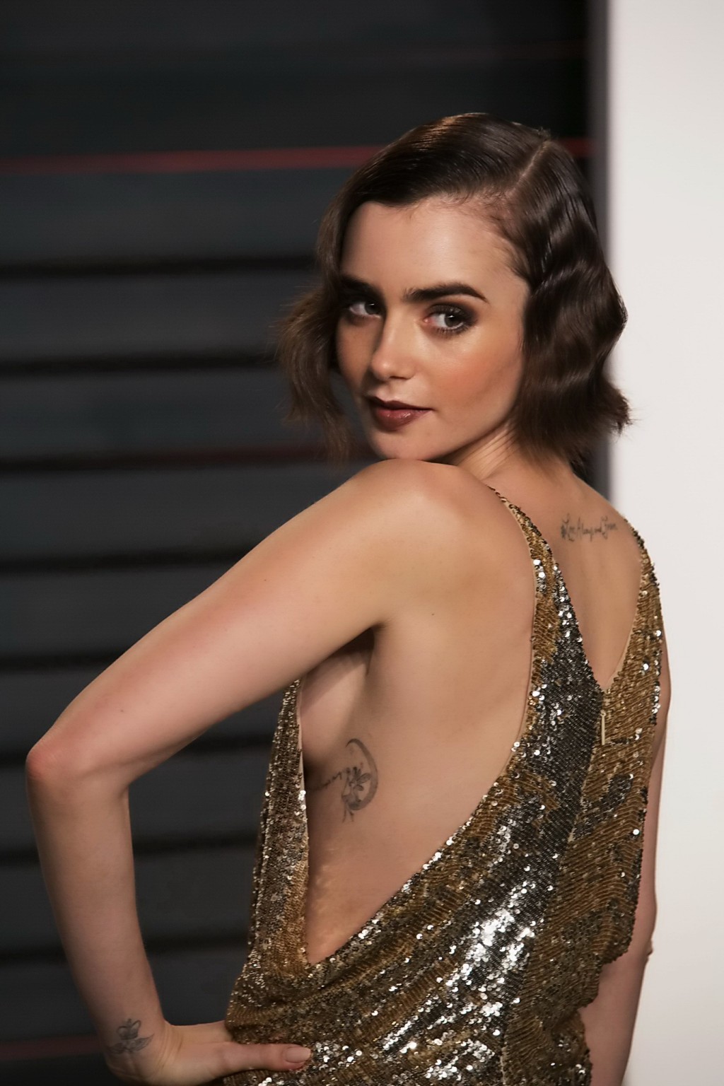 Lily Collins showing sideboob huge cleavage and legs #75145315