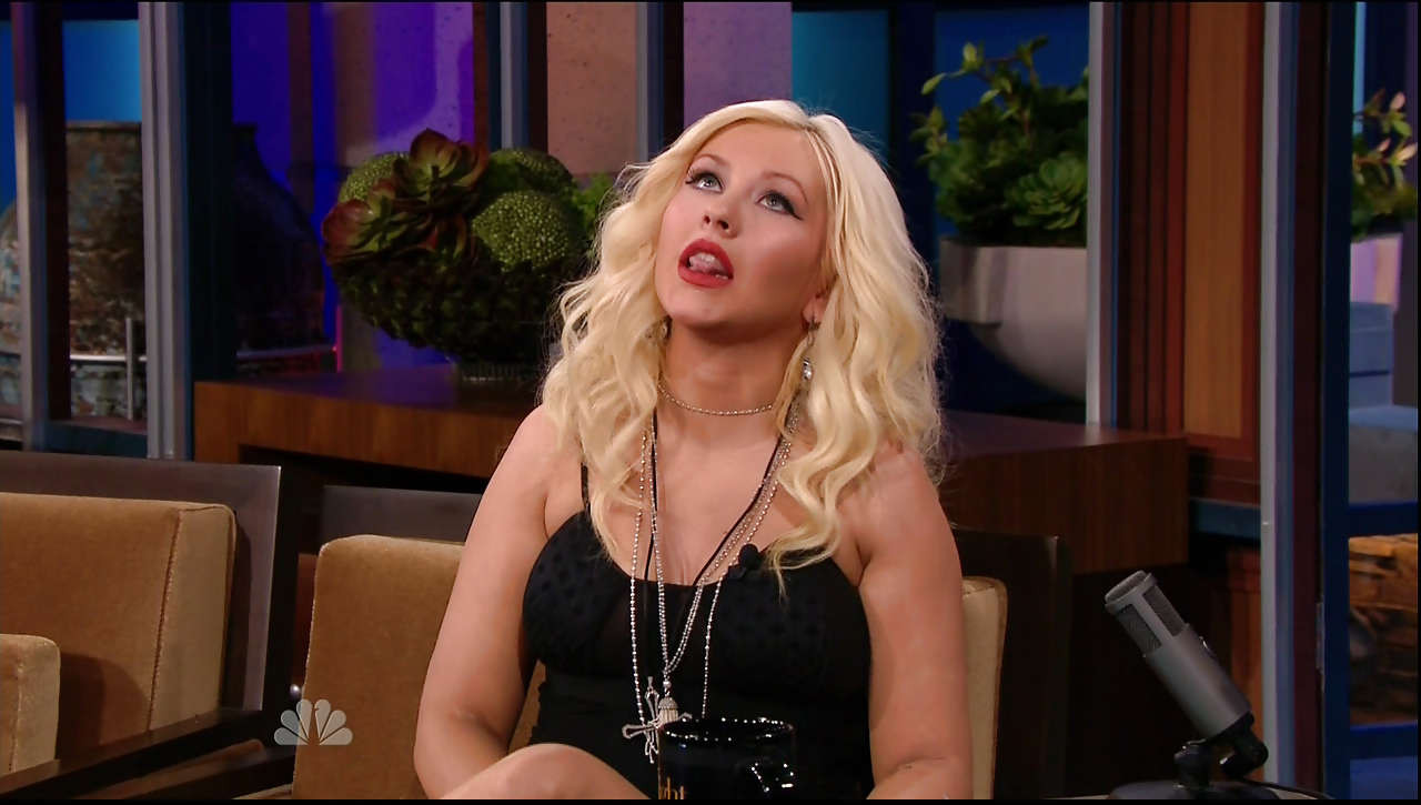 Christina Aguilera showing her nice legs in mini skirt on television show #75301579
