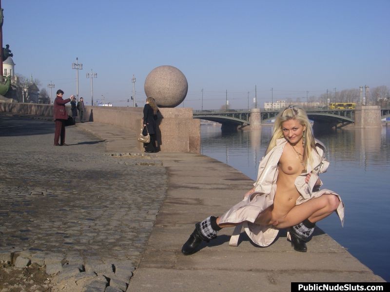 Cheeky blonde demonstrates her naked intimate spots on the seafront #76739854