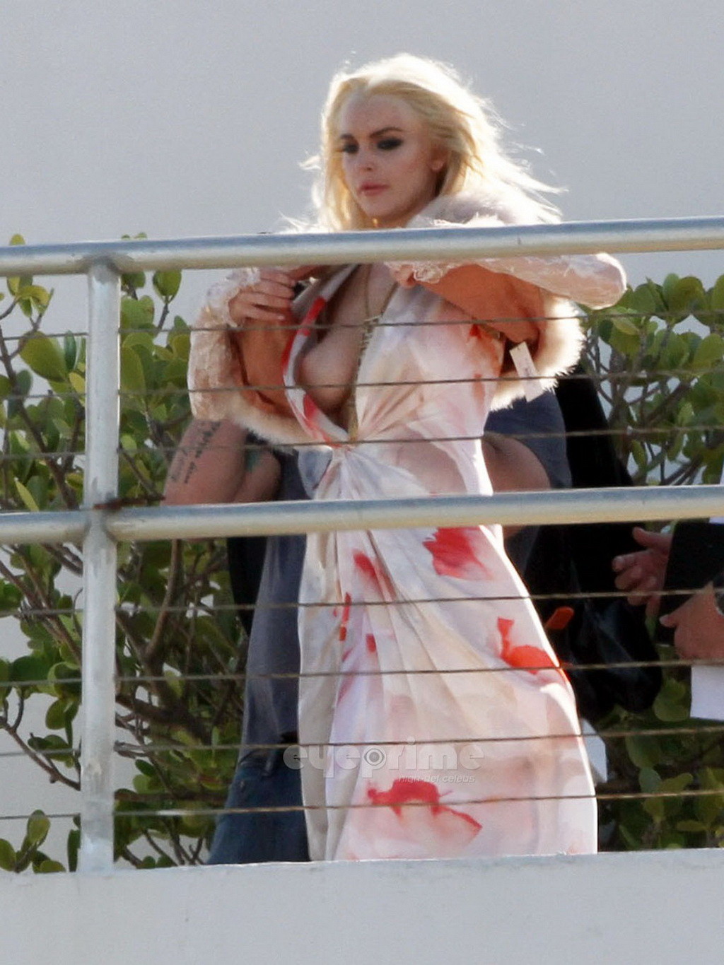 Lindsay Lohan upskirt  showing side boob at the photoshoot on a rooftop in Miami #75303659