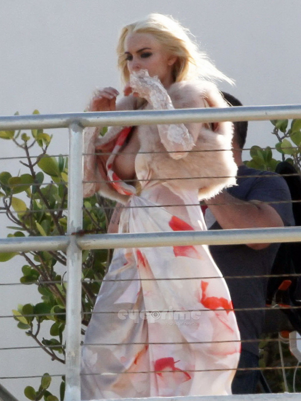 Lindsay Lohan upskirt  showing side boob at the photoshoot on a rooftop in Miami #75303679