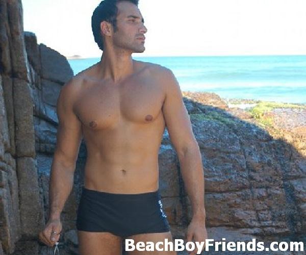 Super sexy and teasing hunks in trunks on the beach #76946310