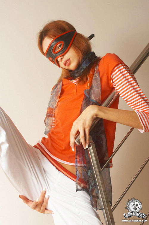 Masked redhead strips while fastened to staircase #72221742