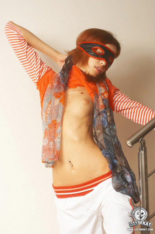 Masked redhead strips while fastened to staircase #72221751