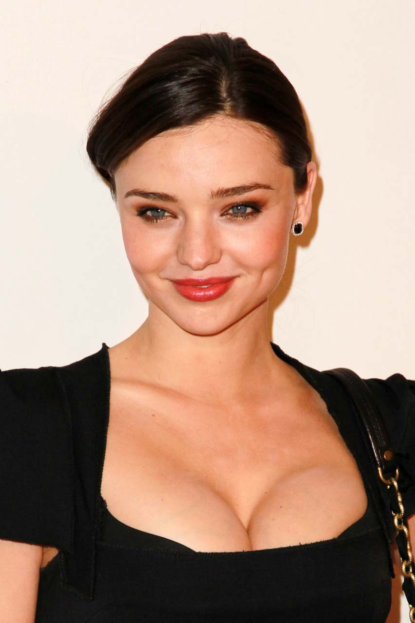 Miranda Kerr posing in sexy black dress and exposing huge cleavage #75306811