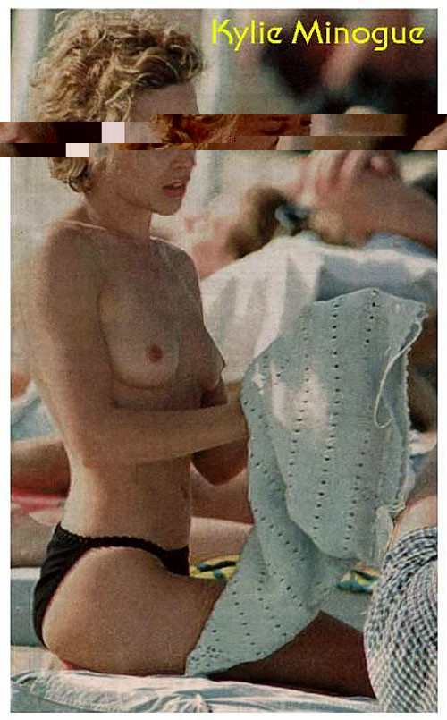 Kylie Minogue che mostra le sue belle tette piccole sulla spiaggia foto paparazzi
 #75402836
