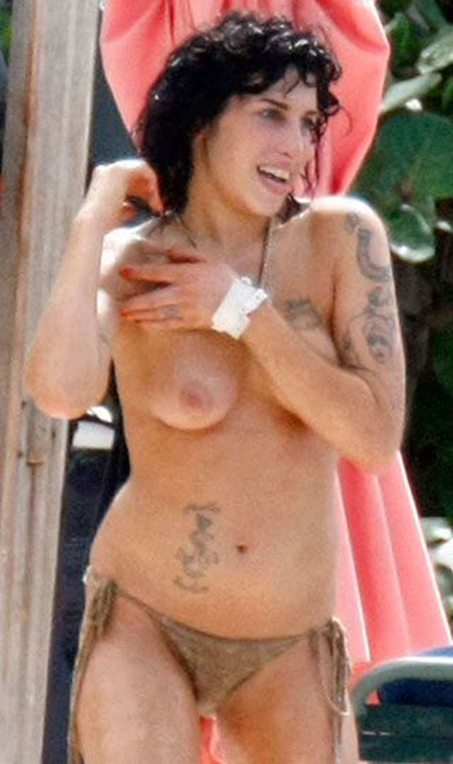 Amy Winehouse upskirt and nipple slip in car and showing her tits on beach papar #75337862