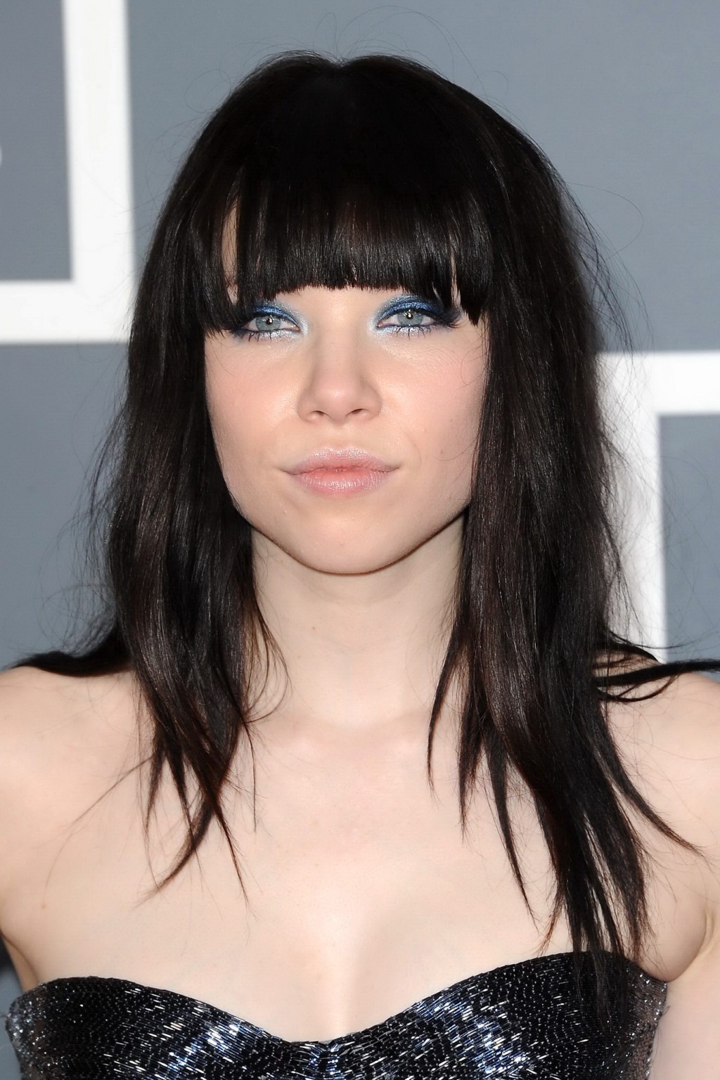 Carly Rae Jepsen cleavy wearing a strapless maxi dress at the 55th Annual Grammy #75241401