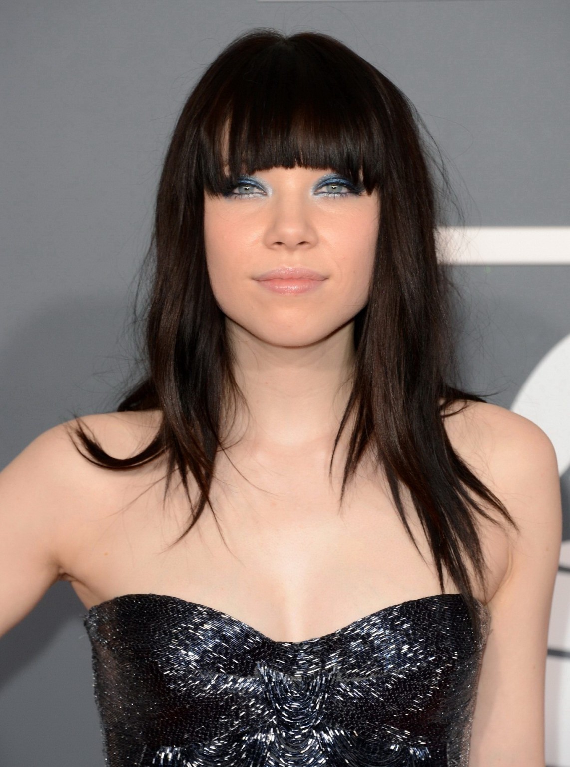 Carly Rae Jepsen cleavy wearing a strapless maxi dress at the 55th Annual Grammy #75241417
