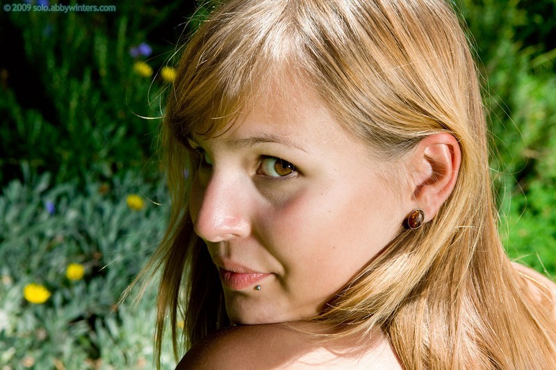 Blonde amateur girl Angelika strips naked in the backyard #78592176