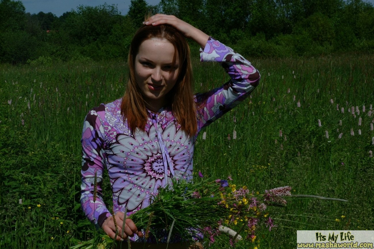 Two teen lesbians spread their lips in a field #70691542