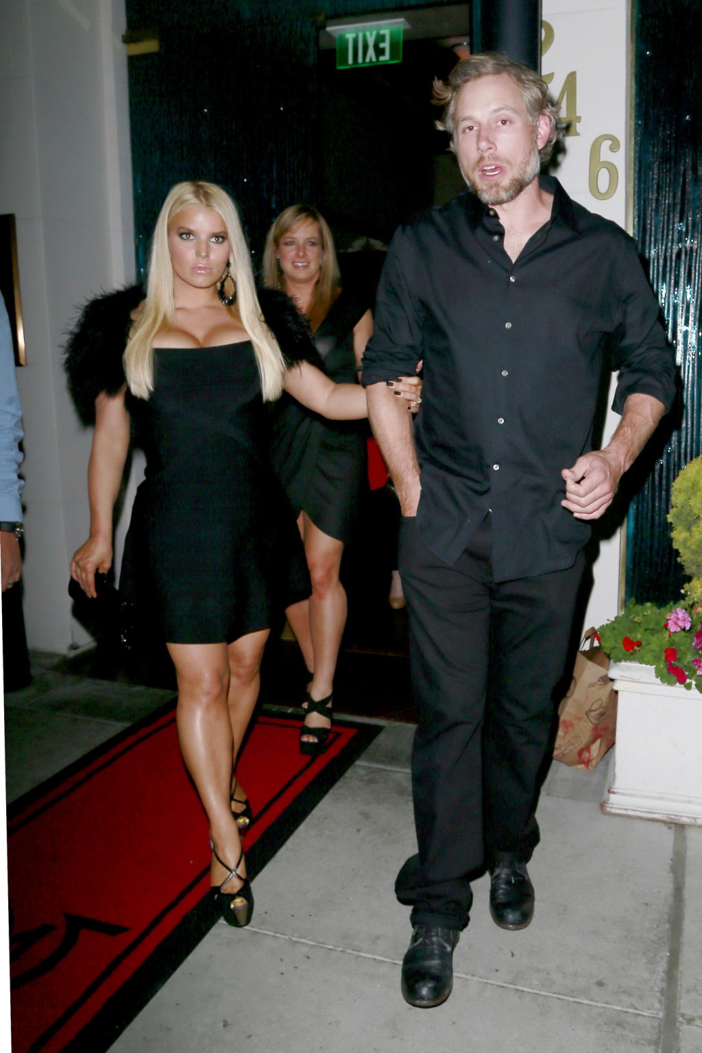 Jessica Simpson busty wearing a black low cut dress at Mastro's Steakhouse in LA #75213915