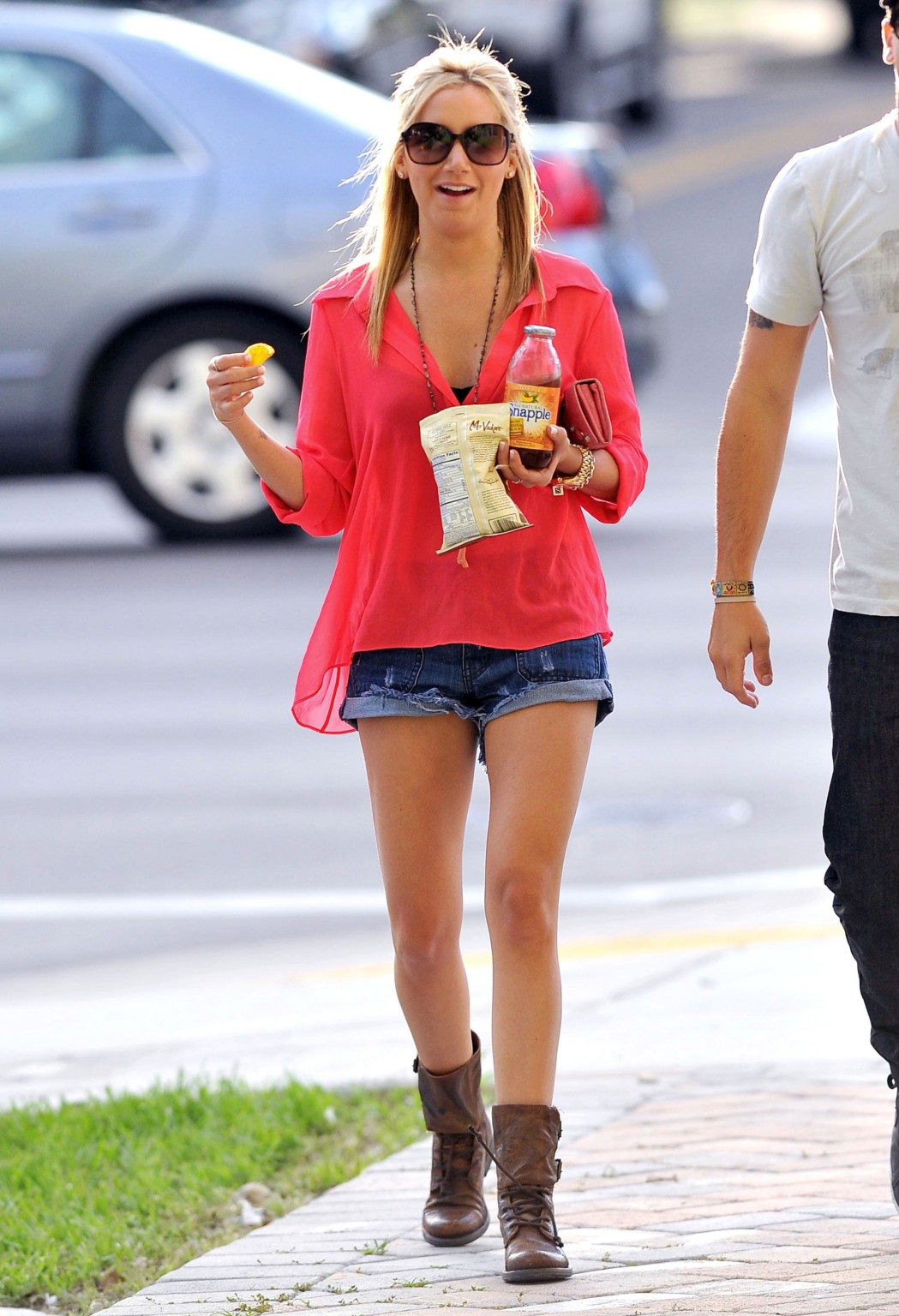 Ashley Tisdale leggy wearing denim shorts  boots at the LAX airport #75284905