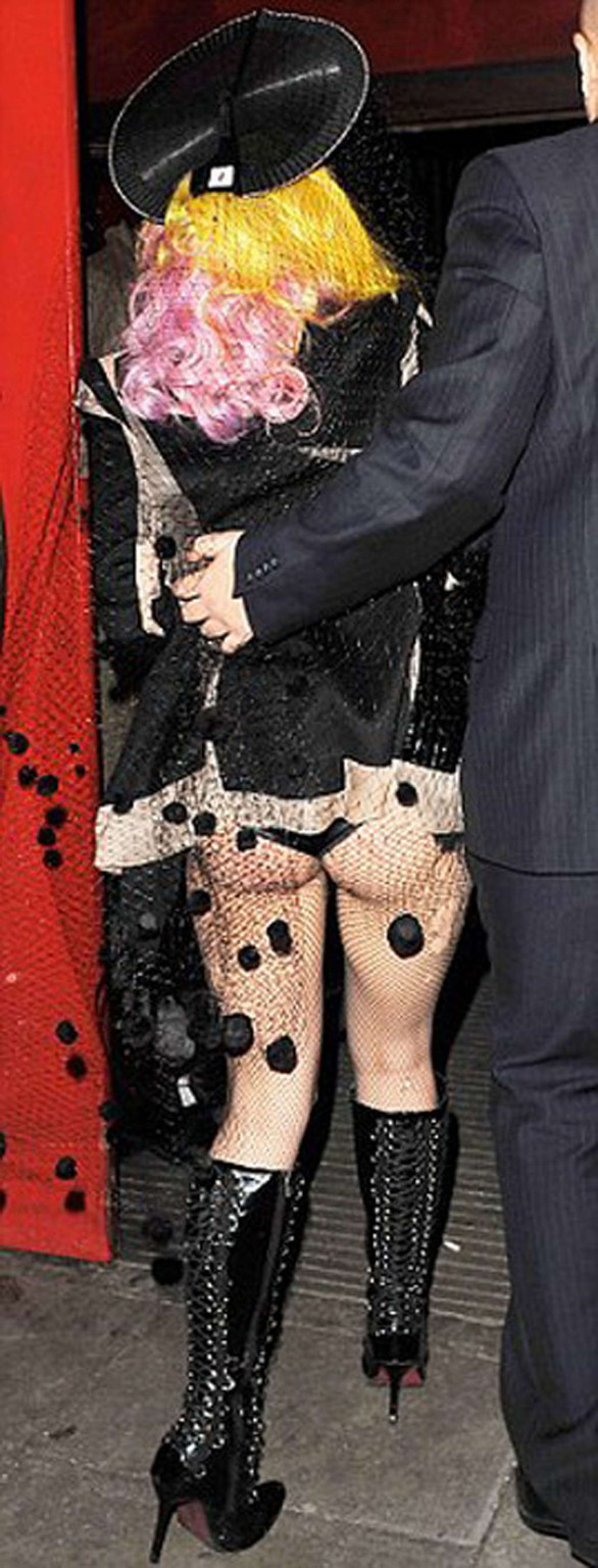 Lady Gaga in ripped fishnets stockings on stage and with long hair #75357189