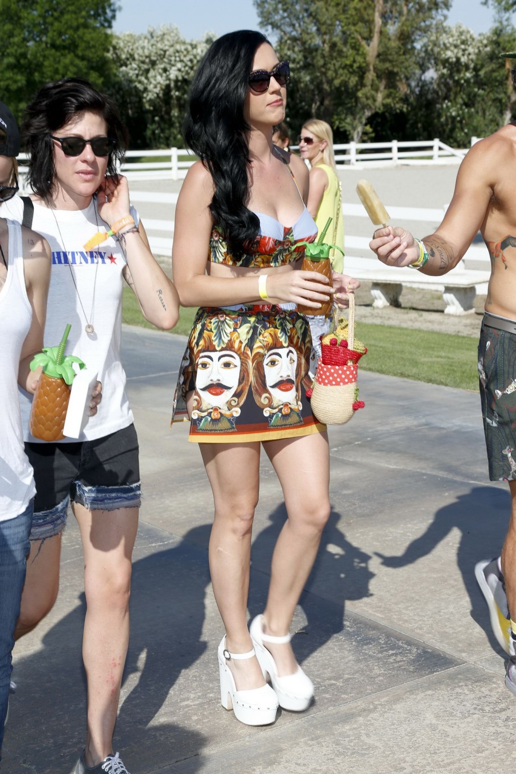 Katy Perry wearing folk designed bikini top and mini skirt at the Lacoste pool p #75235197