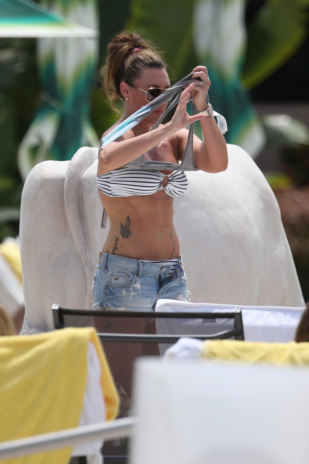 Michelle Heaton stripping to bikini on the set of a fitness show on Miami Beach #75231080