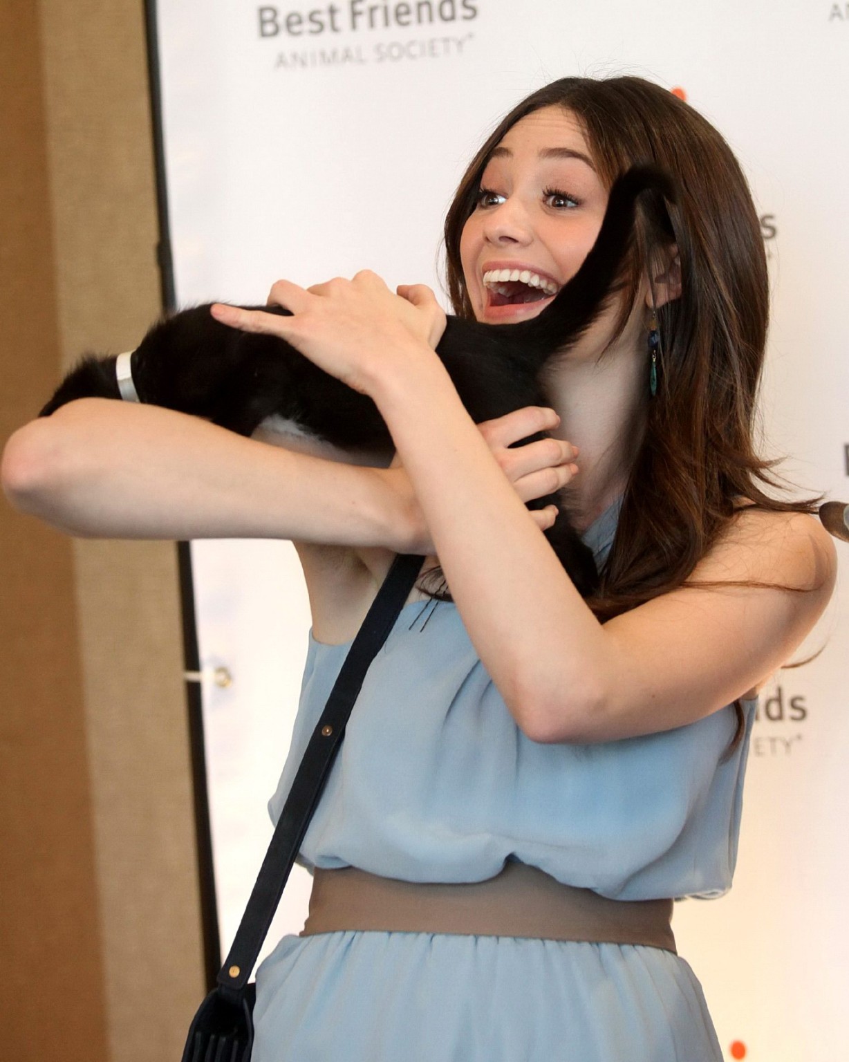 Emmy Rossum petting a kitty at Best Friends Animal Society Acatemy Awards in Los #75316951