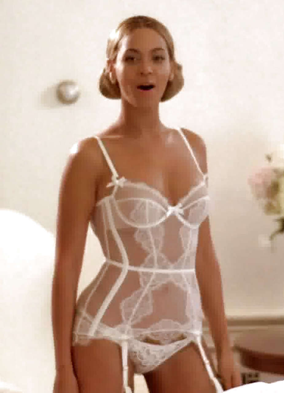 Beyonce Knowles posing in white lingerie and showing little of her ass on stage #75296765