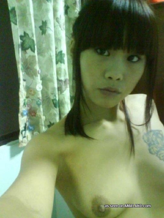 Petite Asian chick teasing and self-shooting naked #69751356